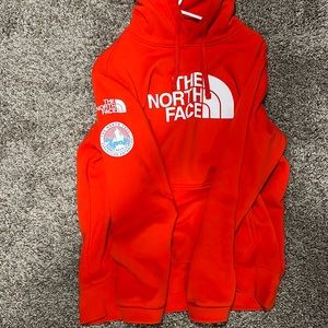 North Face red hoody! Very soft and comfortable. Hardly worn!